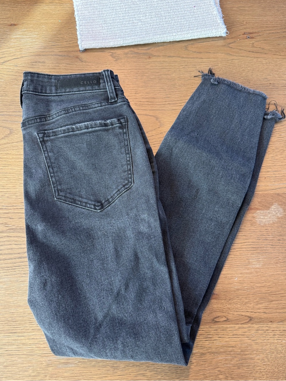 Cello Women's Washed Black Skinny Jeans with Raw Hem